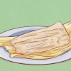 Comiendo tamales