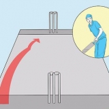 Aprender el agarre correcto para una pelota de impacto (cricket)